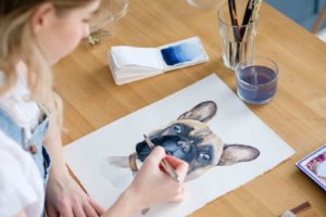 woman paints picture of pug like famous artists and dogs 