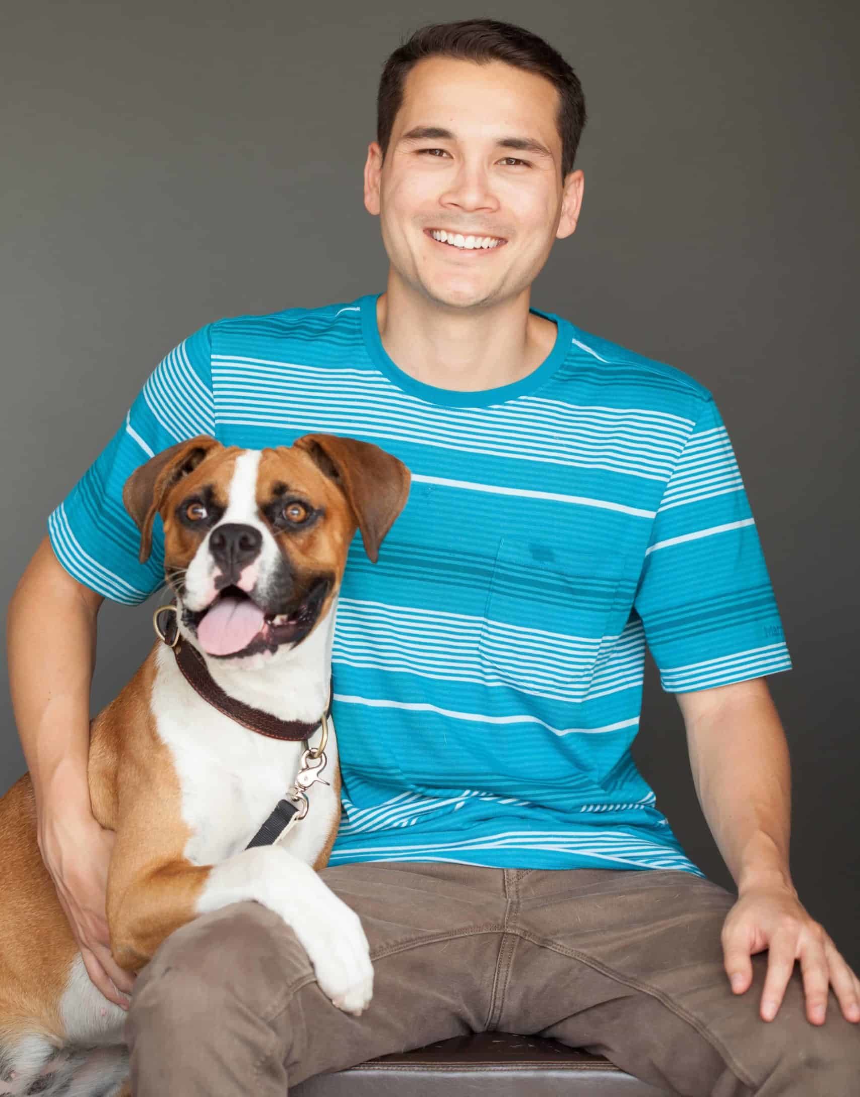 Kyle Goguen, founder of Pawstruck.com, and Tyson, the company's chief canine officer.