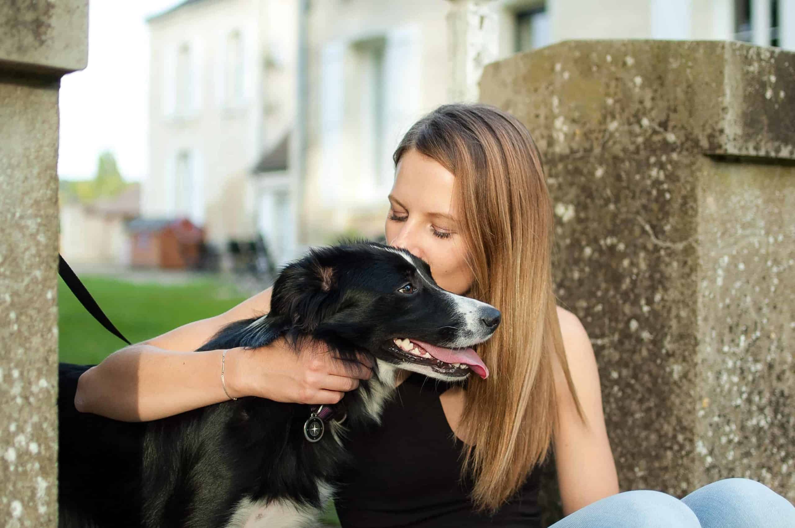 Woman kisses Border Collie. Under HUD's guidelines, licensed medical health professionals include primary care physicians, counselors, psychiatrists, social workers, nurse practitioners, nurses, and physician's assistants.